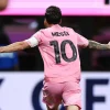 Lionel Messi's Inter Miami 2025-26 Jersey - Back View Lionel Messi in an Inter Miami pink jersey, back view, with "MESSI" and number "10" in the official font.