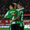 Real Betis 2025-26 Kit Font in Action Real Betis players wearing the 2025-26 kit with official name and number font.