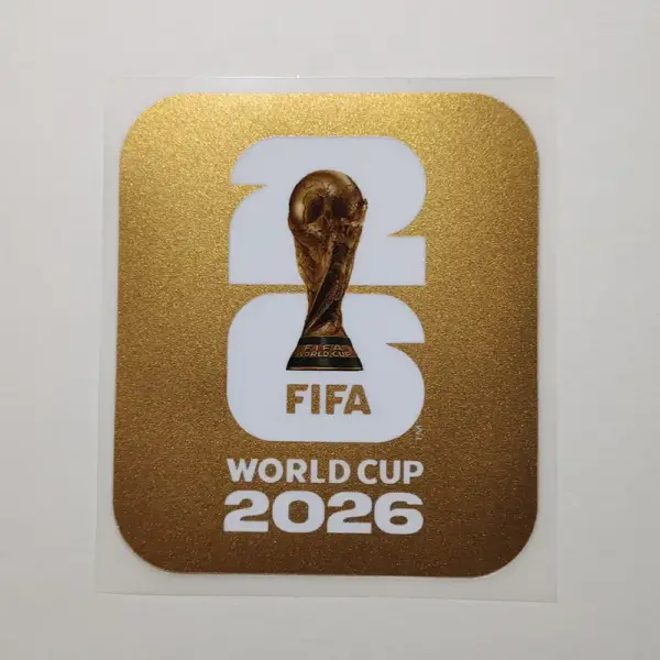 2026-world-cup-sleeve-badges-gold-anti-sublimation-sticker Textured metallic gold FIFA 2026 World Cup sleeve patch sticker