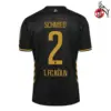 1. FC Koln 2025-2026 away font layout showing player name Schmied and number two on black gold kit