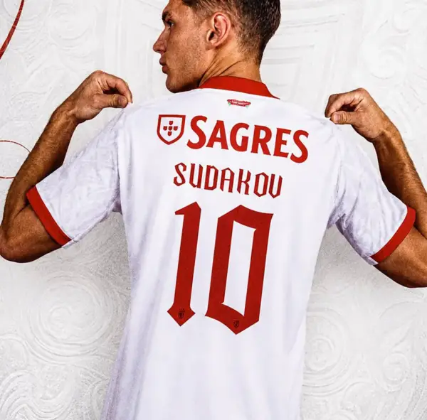 sl-benfica-2026-2027-away-font-physical-sample SL Benfica 2026-2027 away font layout showing player name Sudakov and number ten on white kit