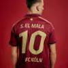 1-fc-köln-2026-2027-special-jersey Player wearing 1. FC Köln 2026-2027 Willi Ostermann special jersey with S. EL MALA 10 gold font printing