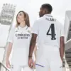 Real Madrid players wearing 2022-2023 home jersey with ALABA 4 stencil font printing