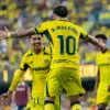 Villarreal CF players celebrating on pitch with La Liga uppercase font printing for A. MOLEIRO 10