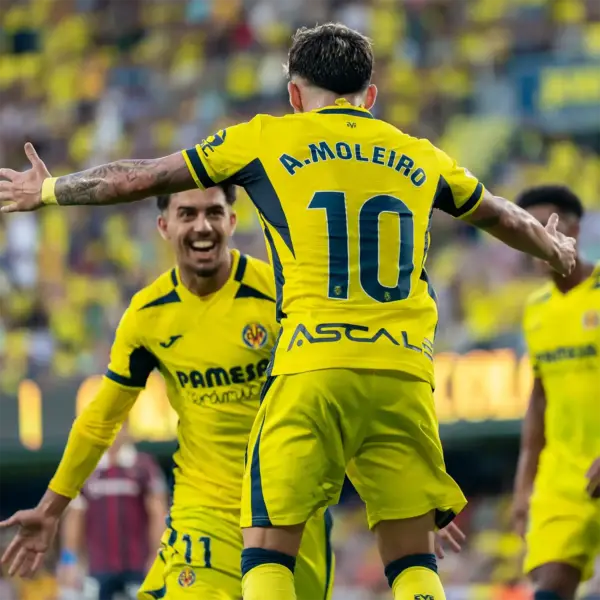 Villarreal CF players celebrating on pitch with La Liga uppercase font printing for A. MOLEIRO 10